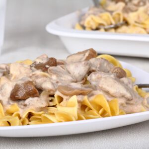 Beef stroganoff with beef tips, mushrooms and sauce over egg noodles